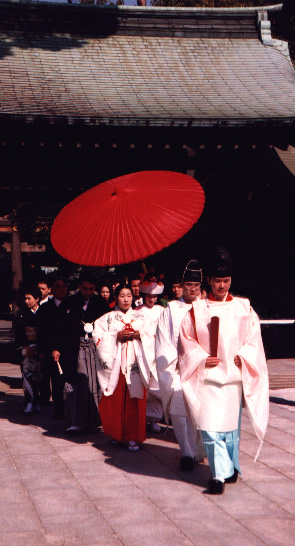 Walking up the aisle. Traditional wedding in Tokyo, Japan. Photographed, Easter 1995